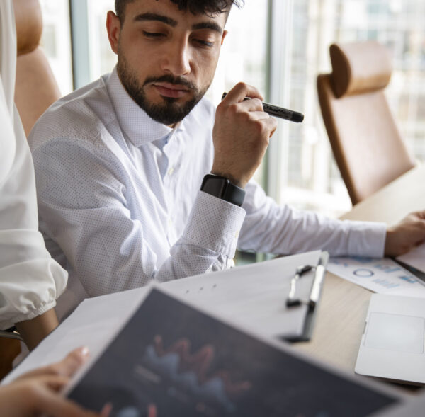 office-workers-using-finance-graphs